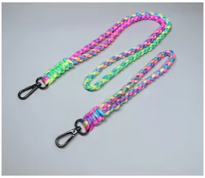 Detail of heavy-duty braided rainbow paracord neck lanyard and wrist strap set accessory