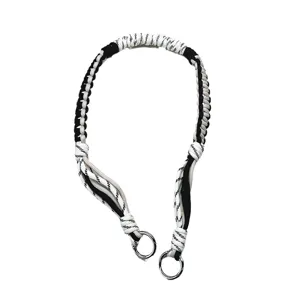 Handgemaakte gevlochten paracord schouderriem voor handtassen in zwart-wit patroon