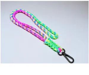 Close-up of rainbow braided paracord lanyard with durable black metal lobster clasp detail