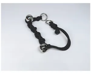 Detailed view of a handmade black braided bag strap featuring silver metal beads.