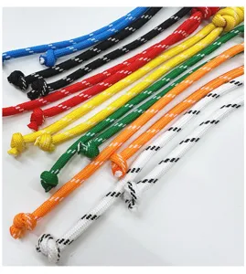 Detail view of colorful hand-woven lanyards with various vibrant pattern designs
