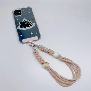 Dragonne de téléphone tressée rose et beige faite à la main avec détail en perle marbre
