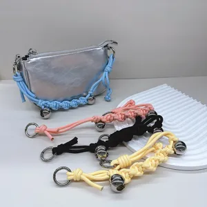 Silver mini baguette bag with colorful hand-woven braided replacement straps and beads