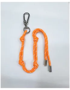 Vibrant orange braided rope bag charm featuring a silver carabiner and adjustable knots