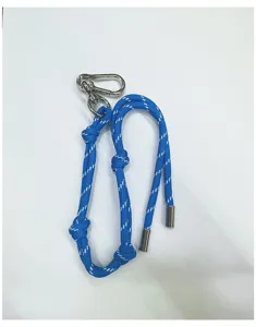 Close-up of blue woven cord lanyard with silver carabiner and metal end caps.