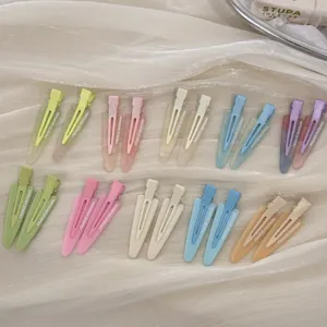 Variété de barrettes à cheveux triangulaires avec texte "FRANCE Handmade"