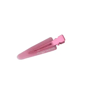 Pince à cheveux triangle rose élégante avec texte France Handmade sur blanc