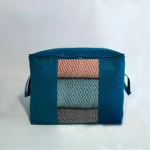 Large navy blue storage bag with a transparent front window for organizing blankets