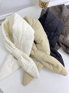 Collection of thick padded cotton scarves in white, beige and black for winter warmth