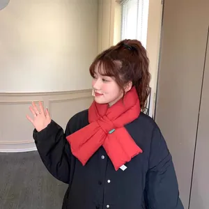 Warm red down cotton cross-neck scarf for women, stylish and thickened winter accessory.