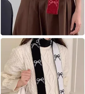 Détail de l'écharpe d'hiver étroite réversible avec un élégant motif de nœud tricoté