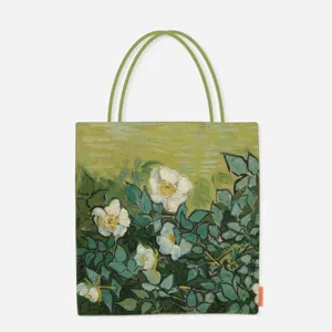 Detailed view of canvas tote bag featuring Van Gogh's Wild Roses oil painting print