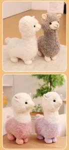 Detail view of cute alpaca plush dolls in white, grey, pink and purple color variants
