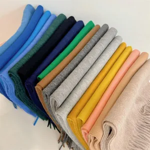 Collection of soft 100% Australian wool cashmere scarves in various colors.