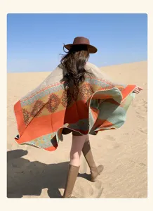 Bohemian ethnic style oversized poncho shawl worn in a desert setting