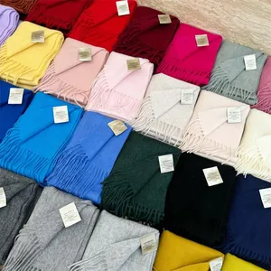 Collection of multi-color 100% Australian wool scarves with soft tassel trim