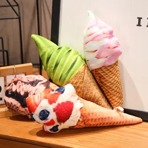 Realistic ice cream cone plush pillows in matcha and strawberry flavors on a wooden shelf