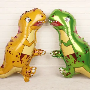 Close-up of yellow and green standing Tyrannosaurus dinosaur foil balloons for party decor