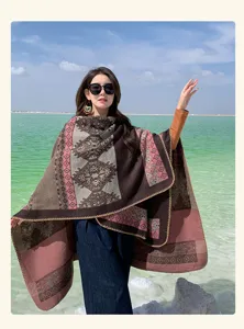 Detailed view of women's ethnic pattern oversized shawl poncho for versatile styling