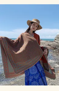 Elegant large striped poncho shawl for women with vintage geometric pattern and fringe edges