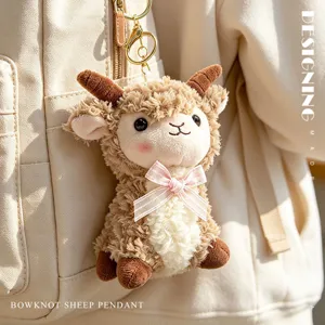 Adorable brown plush sheep pendant keychain with a pink bowknot for backpack charm