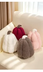 Set of cozy pumpkin shaped plush pillows in soft fleece for Halloween home sofa decoration