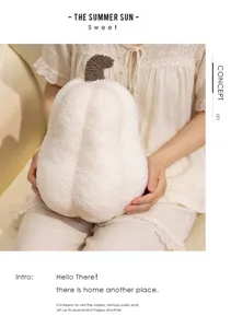 Soft white pumpkin plush pillow detail showing cozy textured fabric in a home setting