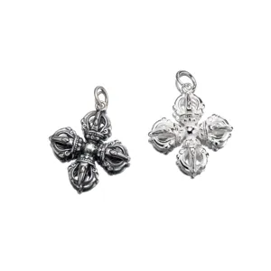 Detailed view of 925 sterling silver vintage and polished Vajra cross pendants