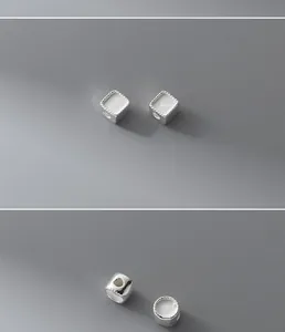 Macro detail view of S925 sterling silver geometric spacer beads for DIY jewelry making.