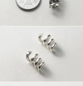 Detailed view of S925 silver snake spiral spacer beads for DIY jewelry and bracelets