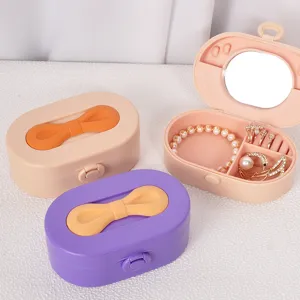 Boîte à Bijoux Portable Avec Miroir Poignée Nœud Petit Étui à Bijoux de Voyage pour Bagues Boucles d'Oreilles Colliers