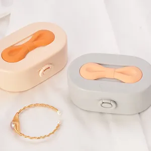 Boîte de rangement bijoux portable élégante avec poignée nœud en silicone pour bagues