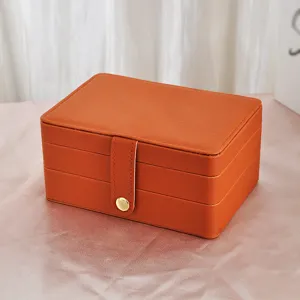 Elegante portagioie arancione a più strati con finitura in pelle e bottone dorato