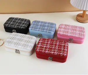 Sammlung von fünf bunten Schmuckschatullen im Tweed-Stil mit Reißverschluss für die Aufbewahrung