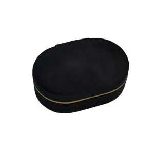 Elegant black oval velvet jewelry box with zipper for portable travel storage and organization