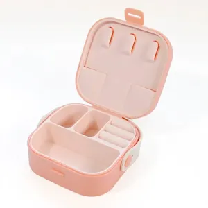 Portable pink silicone jewelry box with multi-functional compartments for rings and necklaces