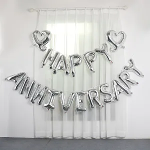 16 inch silver foil balloons spelling Happy Anniversary with heart accents for decor