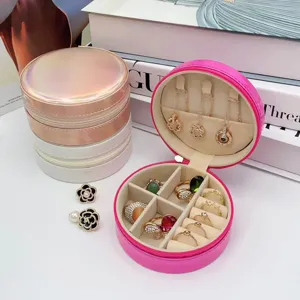 Portable round holographic jewelry storage box with zipper for rings and necklaces