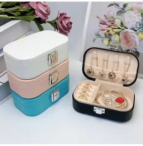 Portable colorful travel jewelry box with multiple compartments for rings and necklaces