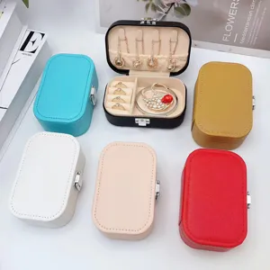 Portable travel jewelry organizer box in multiple colors with ring and necklace storage