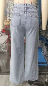 Detailed back view of light blue washed wide-leg denim jeans on a tailor mannequin