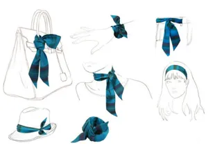 Detail view of a striped skinny scarf showing multiple styling ways on bags and hair