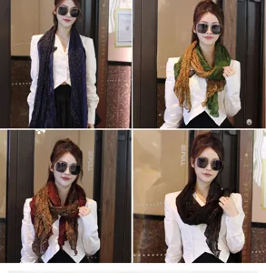 Detail of cotton linen floral pleated scarves in various colors on an Asian model.