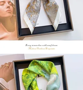 Detailed close-up of two elegantly printed silk-like square scarves in artistic patterns.