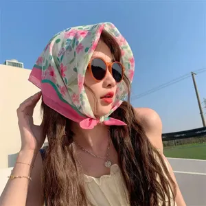 Fresh floral print cotton linen small square scarf worn as a stylish headscarf for women