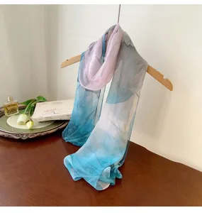 Lightweight georgette scarf with blue and purple floral gradient hanging on a hanger