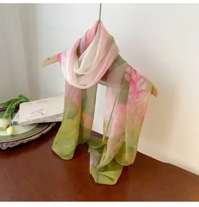 Elegant floral printed georgette long scarf for women displayed on a wooden hanger