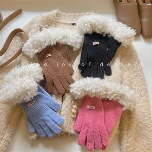 Selection of winter touchscreen gloves with stylish white lambswool cuffs in four colors