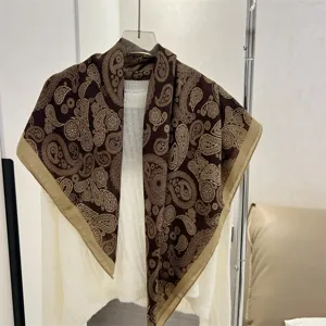 Elegant brown paisley pattern cotton linen square scarf for women on white sweater