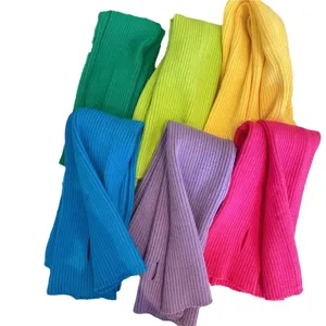 Vibrant long knitted fingerless arm warmers with thumb holes in dopamine colors